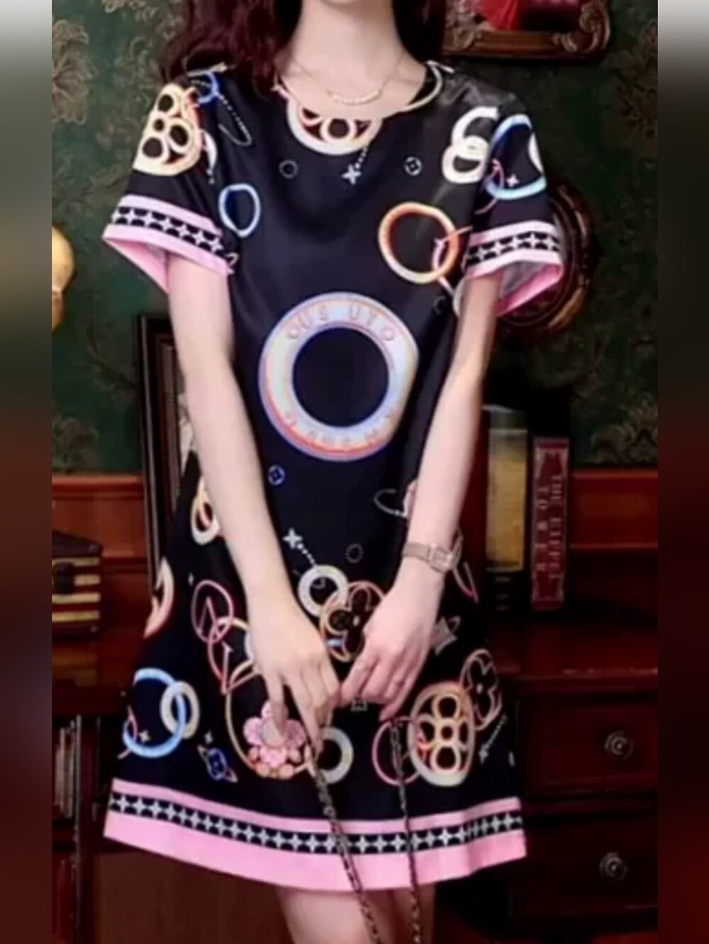 Black Short-Sleeve Mini Dress with Pink Trim and Multicolor Ring Print